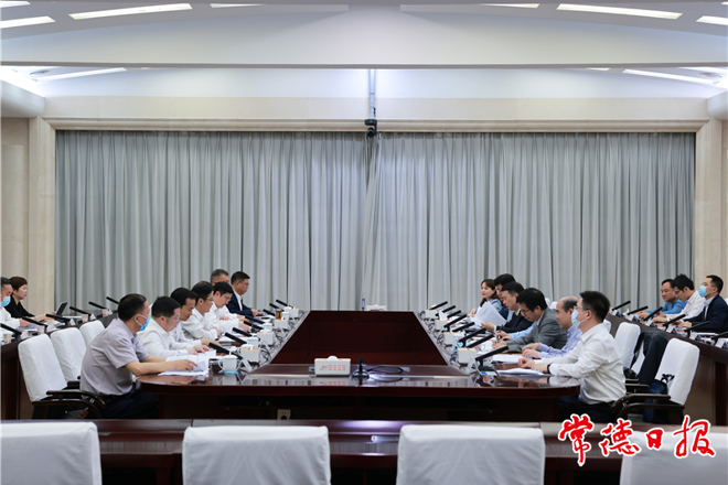 曹志强周振宇与省国资委考察团一行座谈