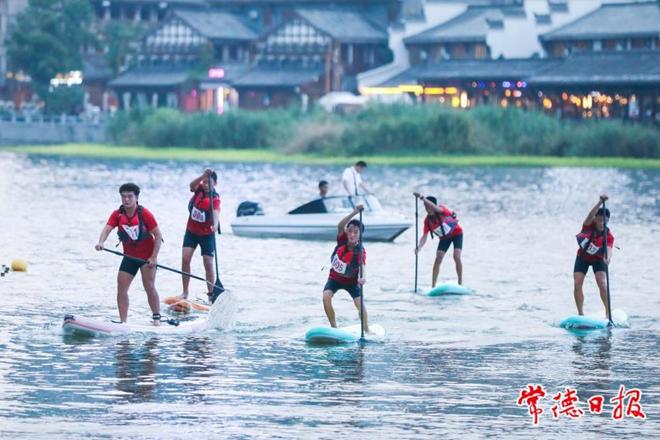 【组图】湘西北200余名运动员齐聚穿紫河畔竞技桨板