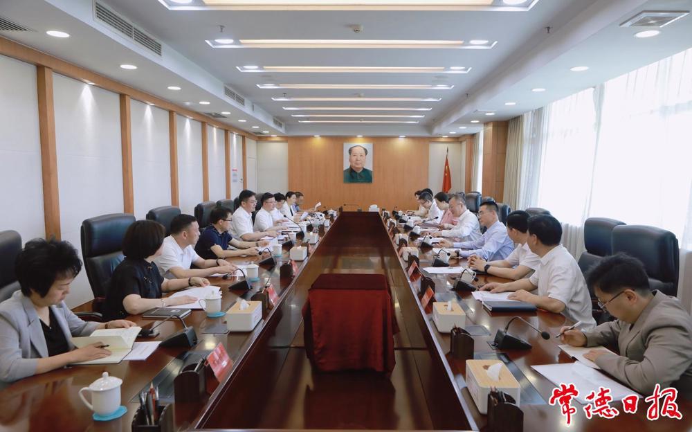 罗毅君与湖南电信万鹏一行座谈