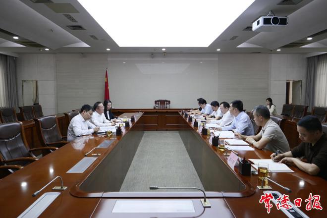 周振宇会见保利发展湖南公司陆戎一行