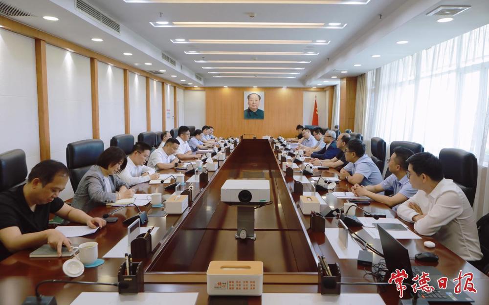 罗毅君周振宇与中国科学院院士陈学思举行工作会谈