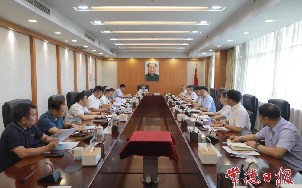 罗毅君与中国人寿湖南省分公司黄胤立一行举行工作会谈