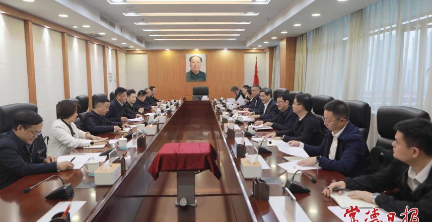 罗毅君与华电湖南公司党委书记刘明杰一行举行工作会谈