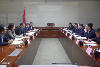 周振宇会见省农信联社黄向阳一行